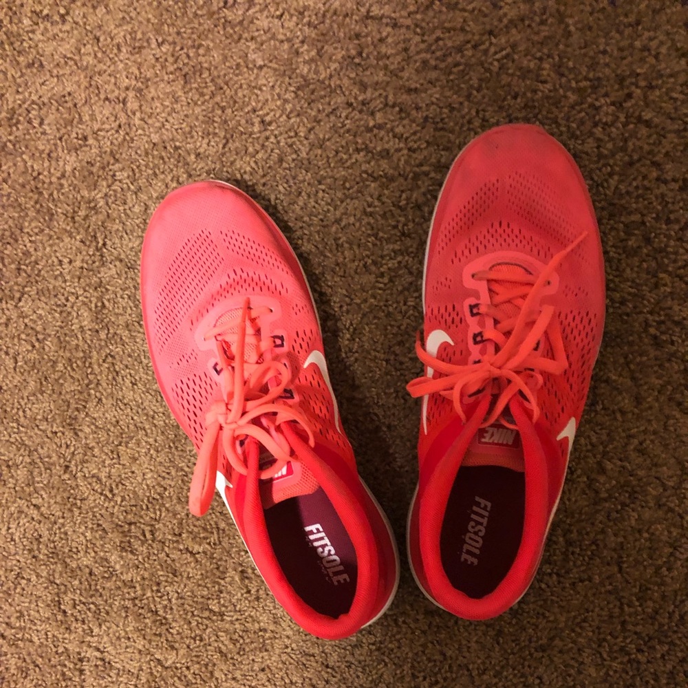 Nike bright orange coral red shoes!